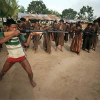 YOUNG ASHANINKAS TRAINED BY THE ARMY