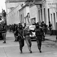 POLICE TAKE SAN FERNANDO