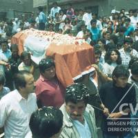 Relatives of Pascuala Rosado mourn her death during her funeral