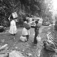 A group of Ayacuchan residents flee their community with their belongings