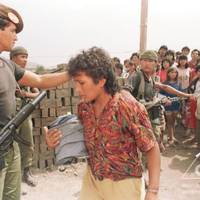 Army members detain residents at the Jorge Félix Raucana settlement 2