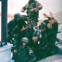 Special Forces commandos celebrate the rescue of hostages from the Japanese ambassador's residence
