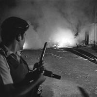 A car bomb explodes three blocks from an APRA rally