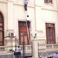 Martin Rivas escapes through one of the side windows of Congress