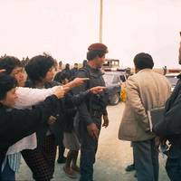Villa El Salvador residents in Lima point out an alleged Shining Path member